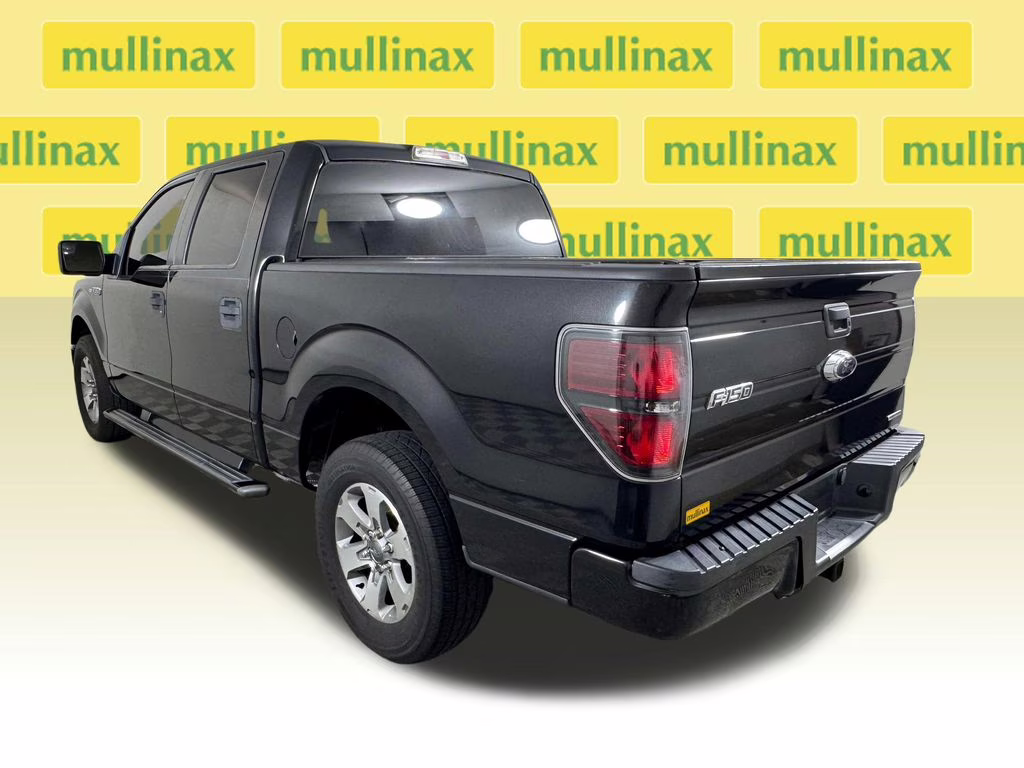 2011 Tuxedo Black Metallic Ford F-150 XLT RWD Truck