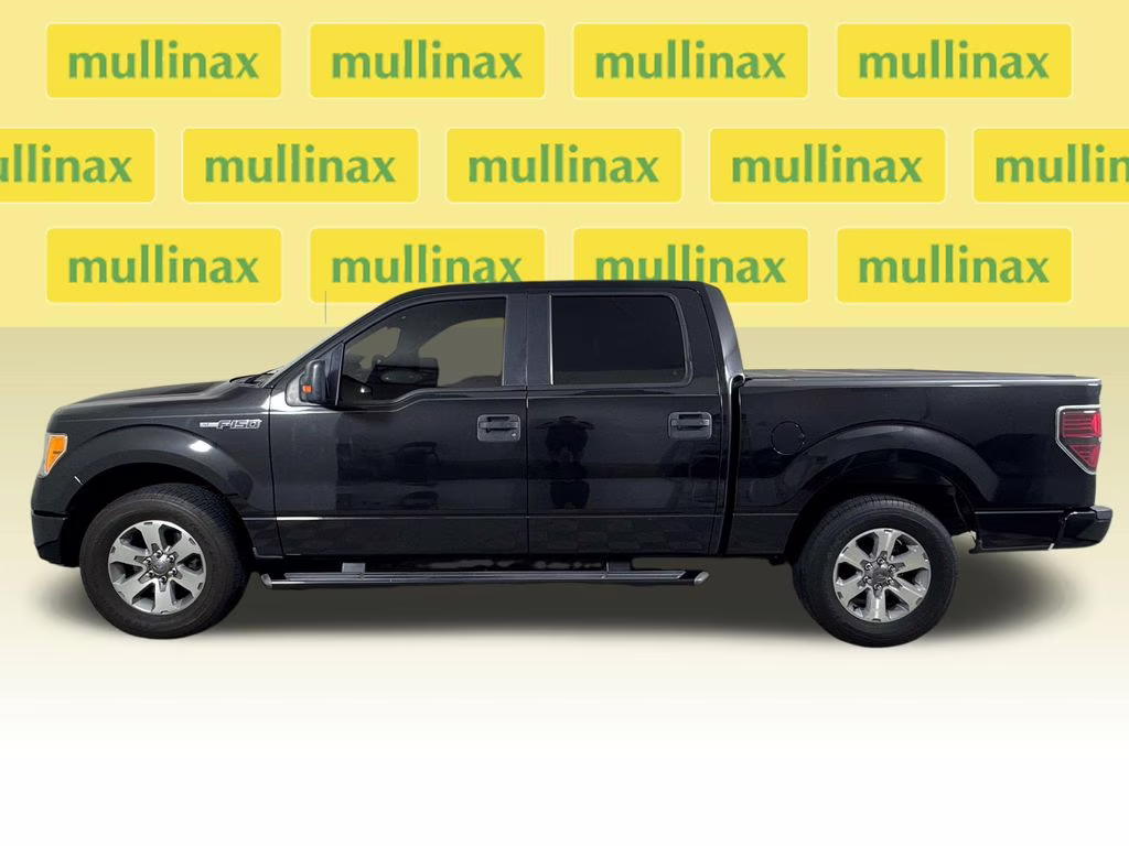 2011 Tuxedo Black Metallic Ford F-150 XLT RWD Truck