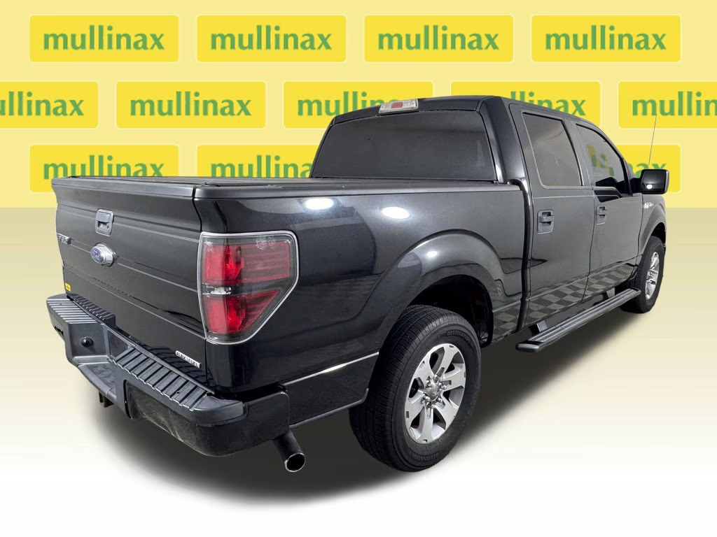 2011 Tuxedo Black Metallic Ford F-150 XLT RWD Truck
