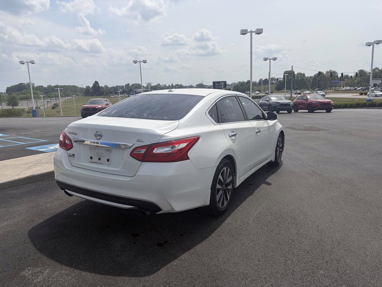 2016 Super Black Nissan Altima 2.5 SL FWD Sedan
