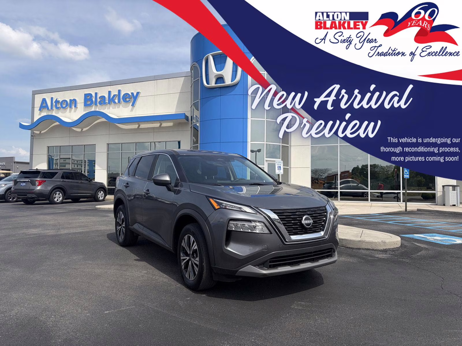2023 Boulder Gray Pearl/Super Black Nissan Rogue SV AWD SUV