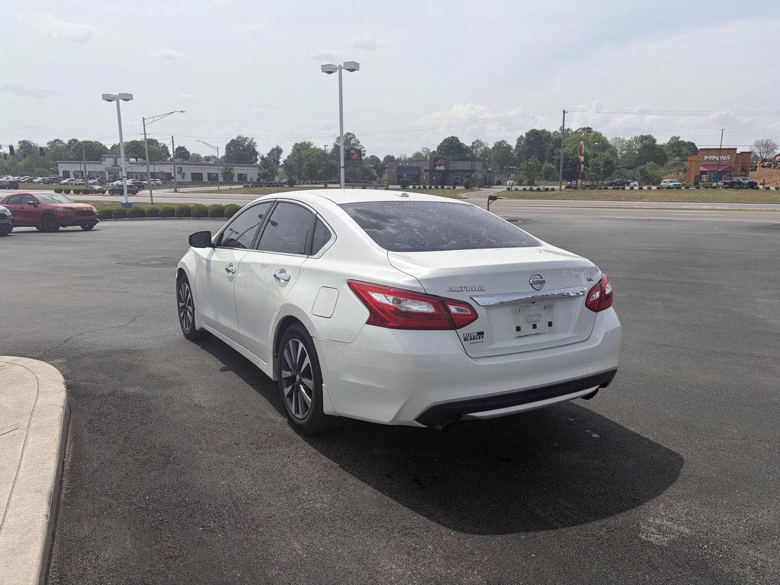 2016 Super Black Nissan Altima 2.5 SL FWD Sedan