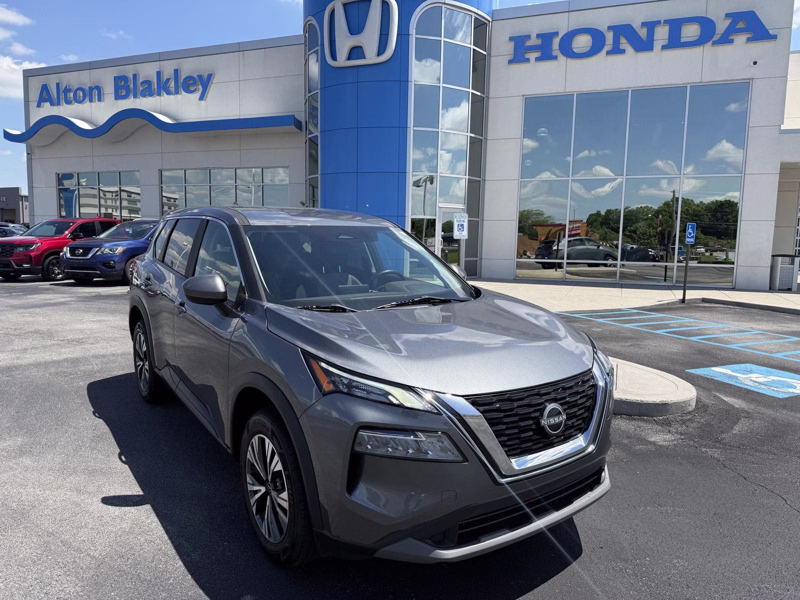 2023 Boulder Gray Pearl/Super Black Nissan Rogue SV AWD SUV