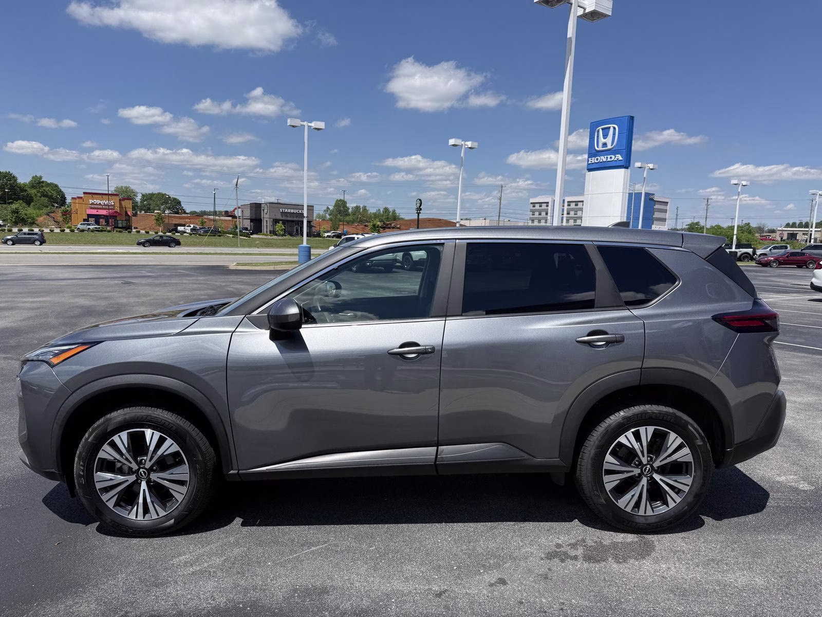 2023 Boulder Gray Pearl/Super Black Nissan Rogue SV AWD SUV