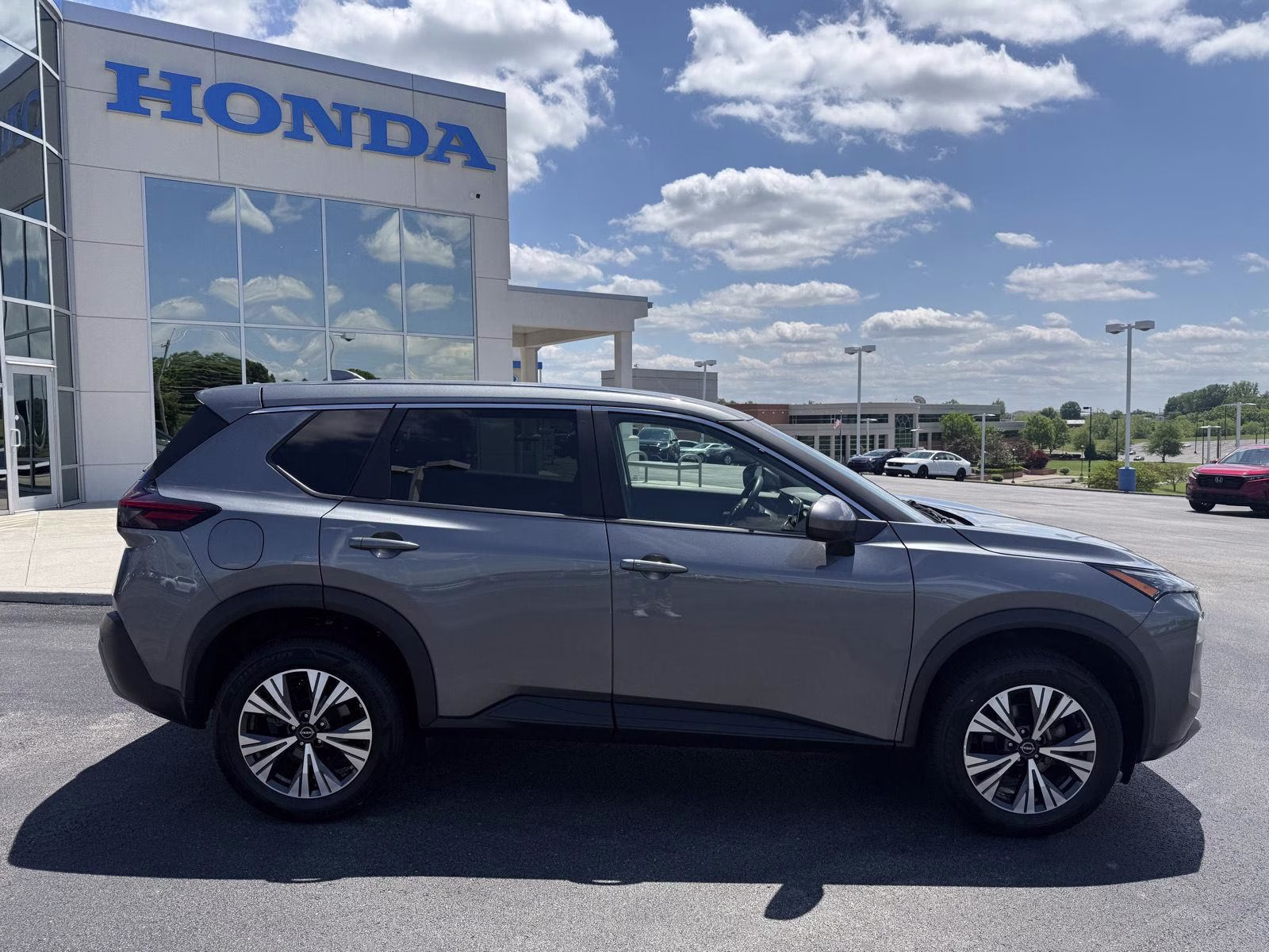 2023 Boulder Gray Pearl/Super Black Nissan Rogue SV AWD SUV