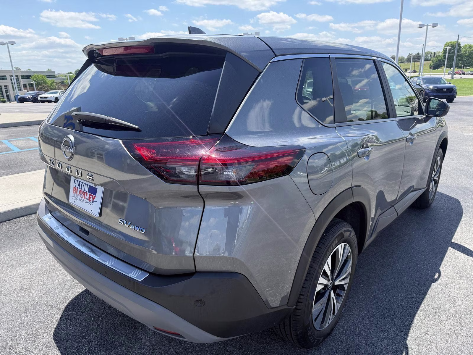 2023 Boulder Gray Pearl/Super Black Nissan Rogue SV AWD SUV