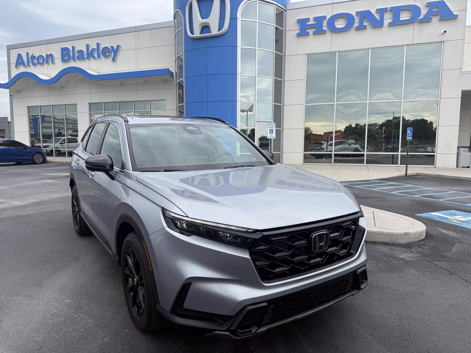 2024 Lunar Silver Metallic Honda CR-V Hybrid Sport-L AWD 4dr AWD