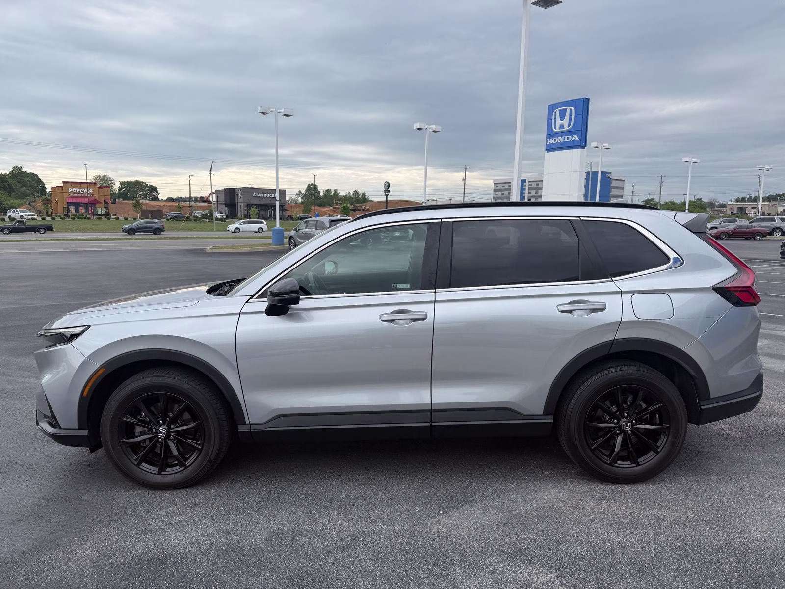 2024 Lunar Silver Metallic Honda CR-V Hybrid Sport-L AWD 4dr AWD
