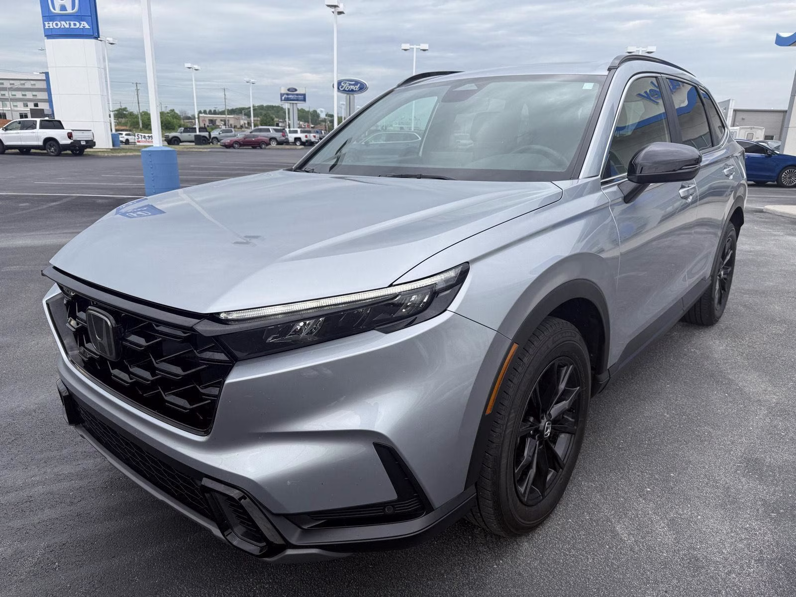 2024 Lunar Silver Metallic Honda CR-V Hybrid Sport-L AWD 4dr AWD