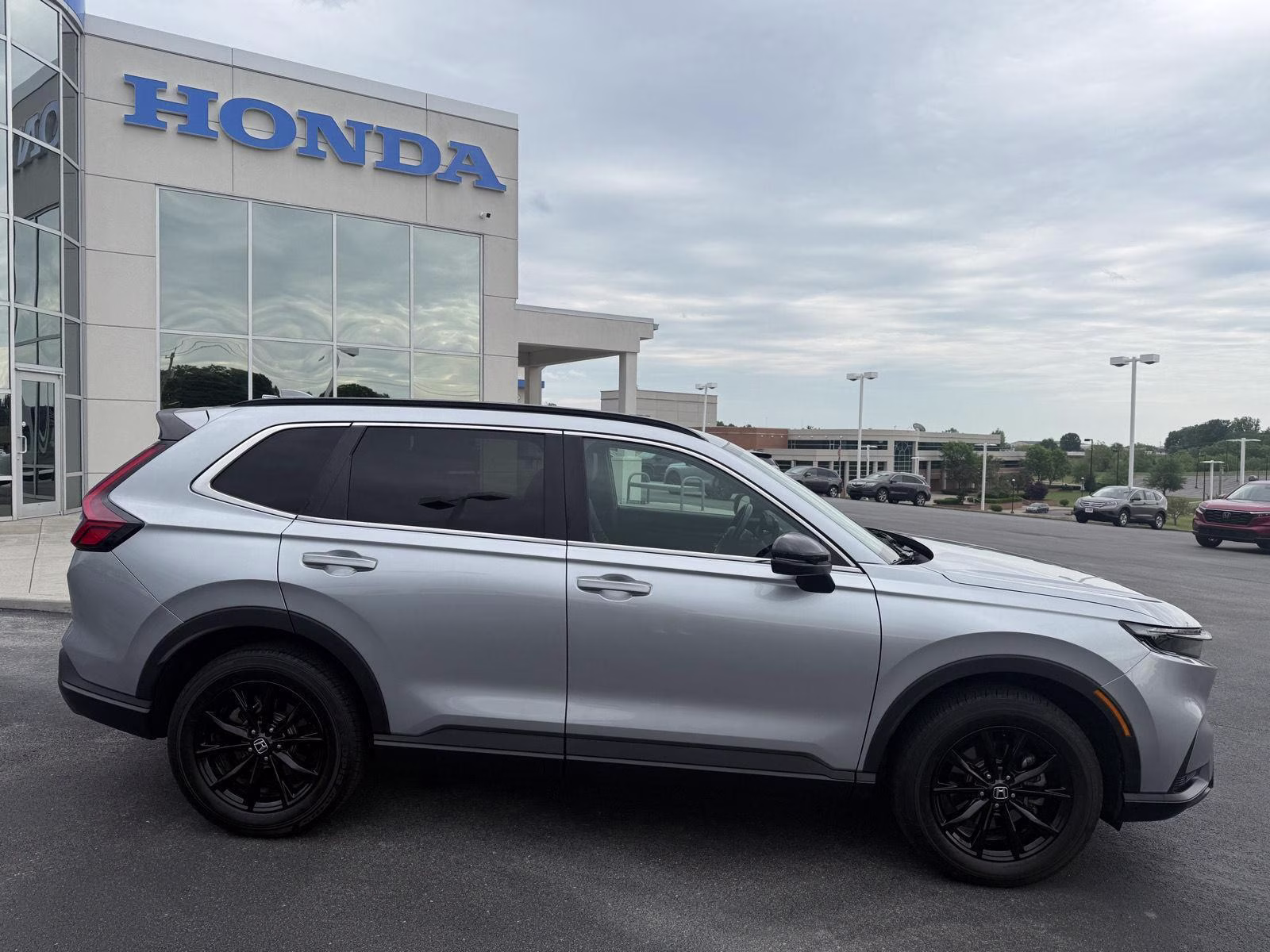 2024 Lunar Silver Metallic Honda CR-V Hybrid Sport-L AWD 4dr AWD