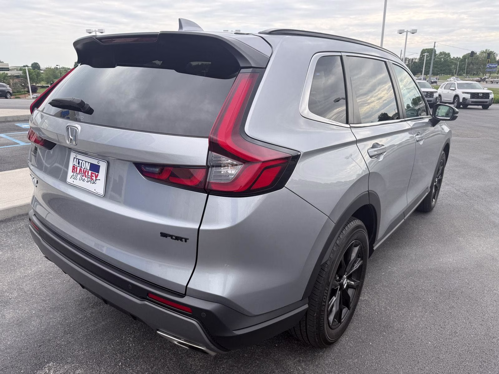 2024 Lunar Silver Metallic Honda CR-V Hybrid Sport-L AWD 4dr AWD