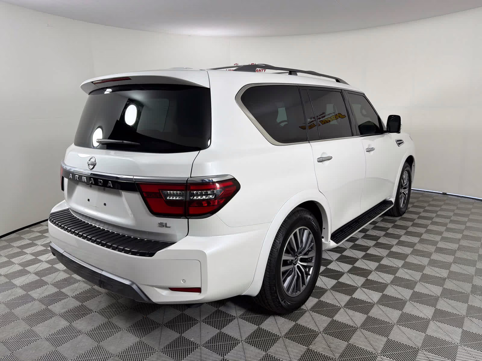 2023 Aspen White Tricoat Nissan Armada SL RWD SUV