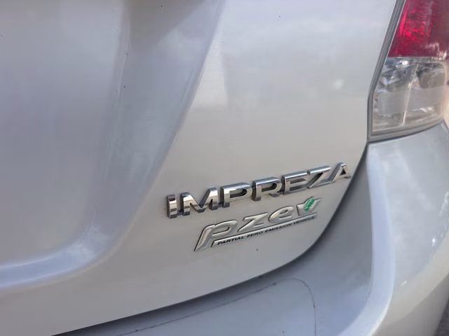 2014 Satin White Pearl Subaru Impreza 2.0i Premium AWD Sedan