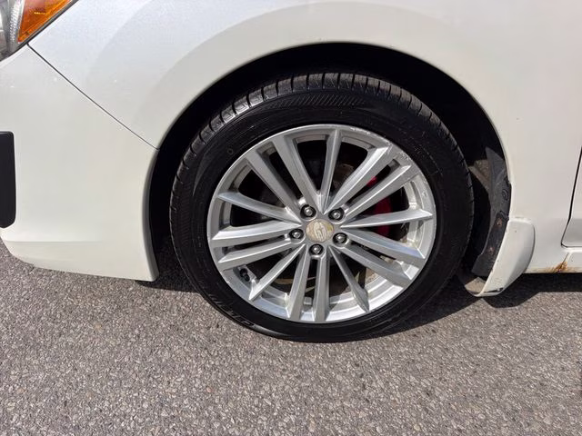 2014 Satin White Pearl Subaru Impreza 2.0i Premium AWD Sedan