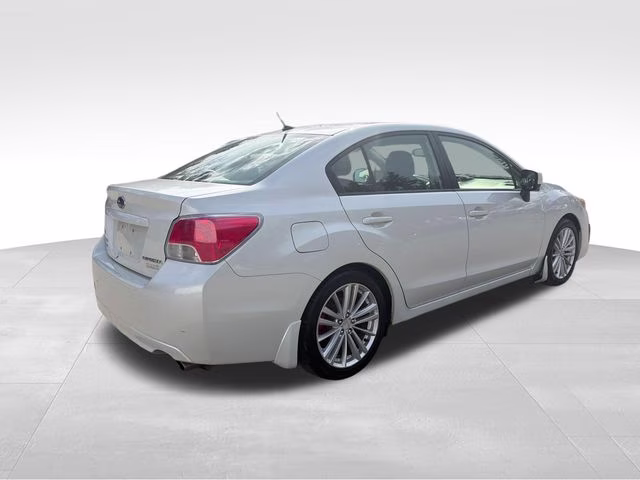 2014 Satin White Pearl Subaru Impreza 2.0i Premium AWD Sedan