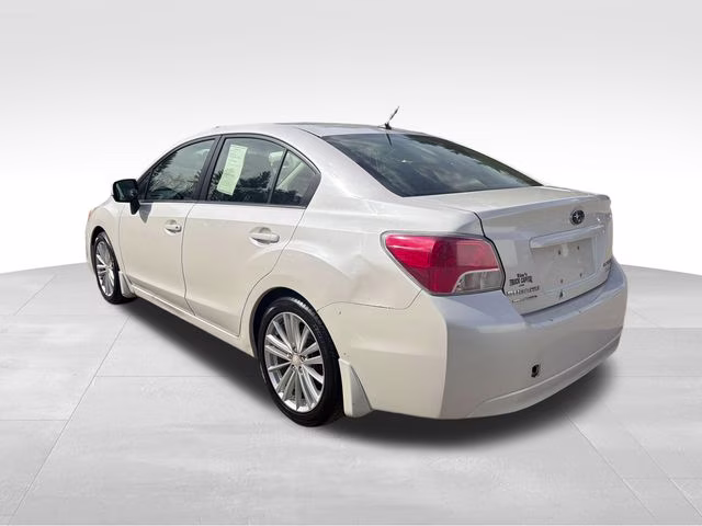 2014 Satin White Pearl Subaru Impreza 2.0i Premium AWD Sedan