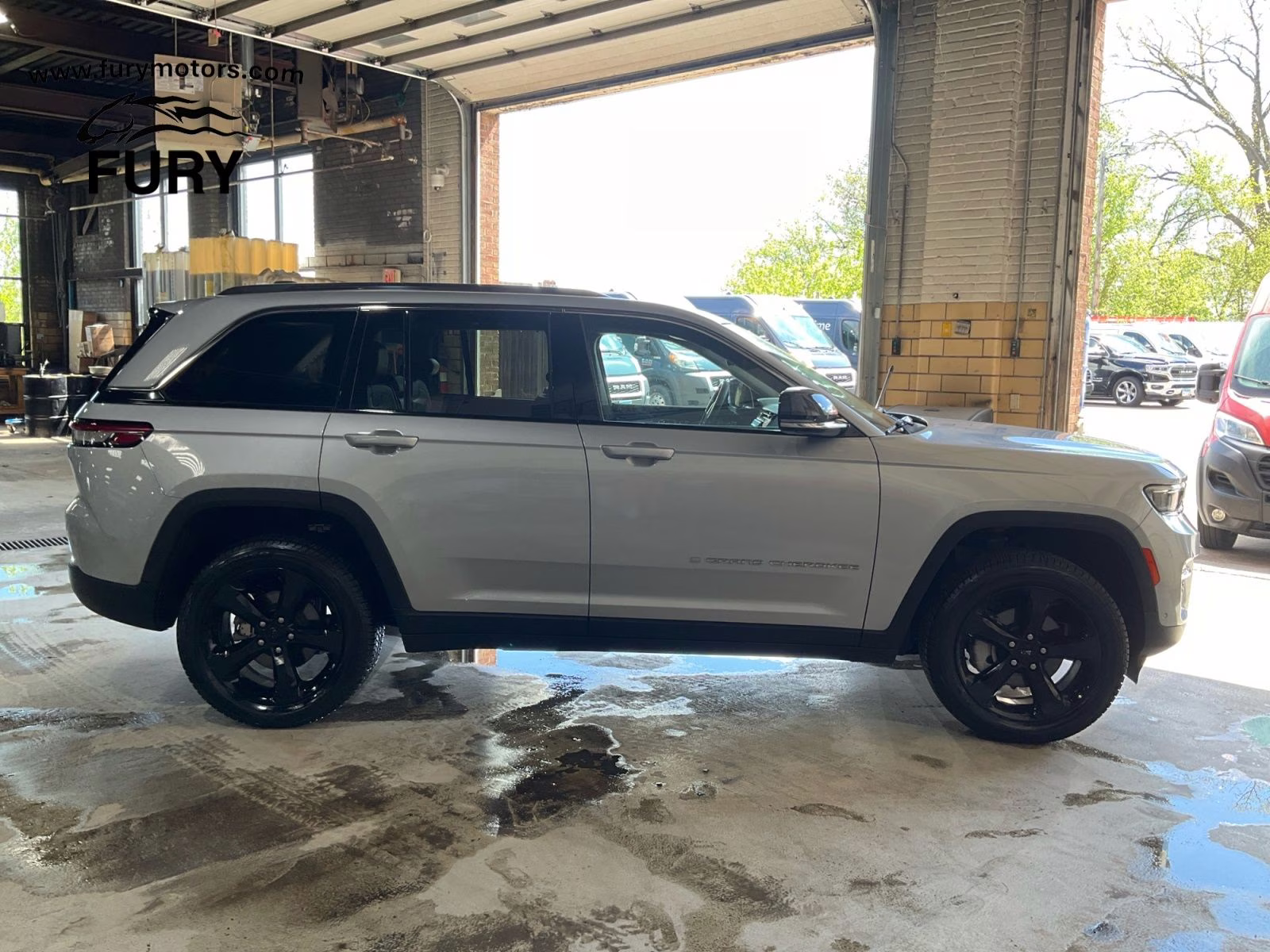 2023 Silver Zynith Jeep Grand Cherokee Limited 4X4 SUV