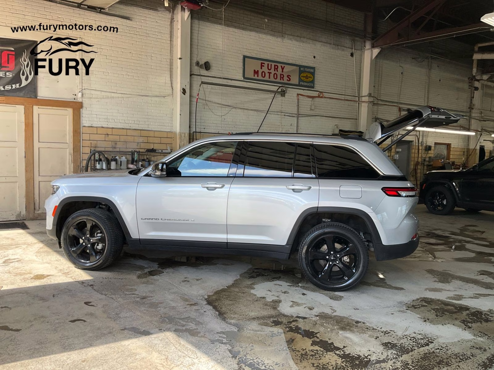 2023 Silver Zynith Jeep Grand Cherokee Limited 4X4 SUV