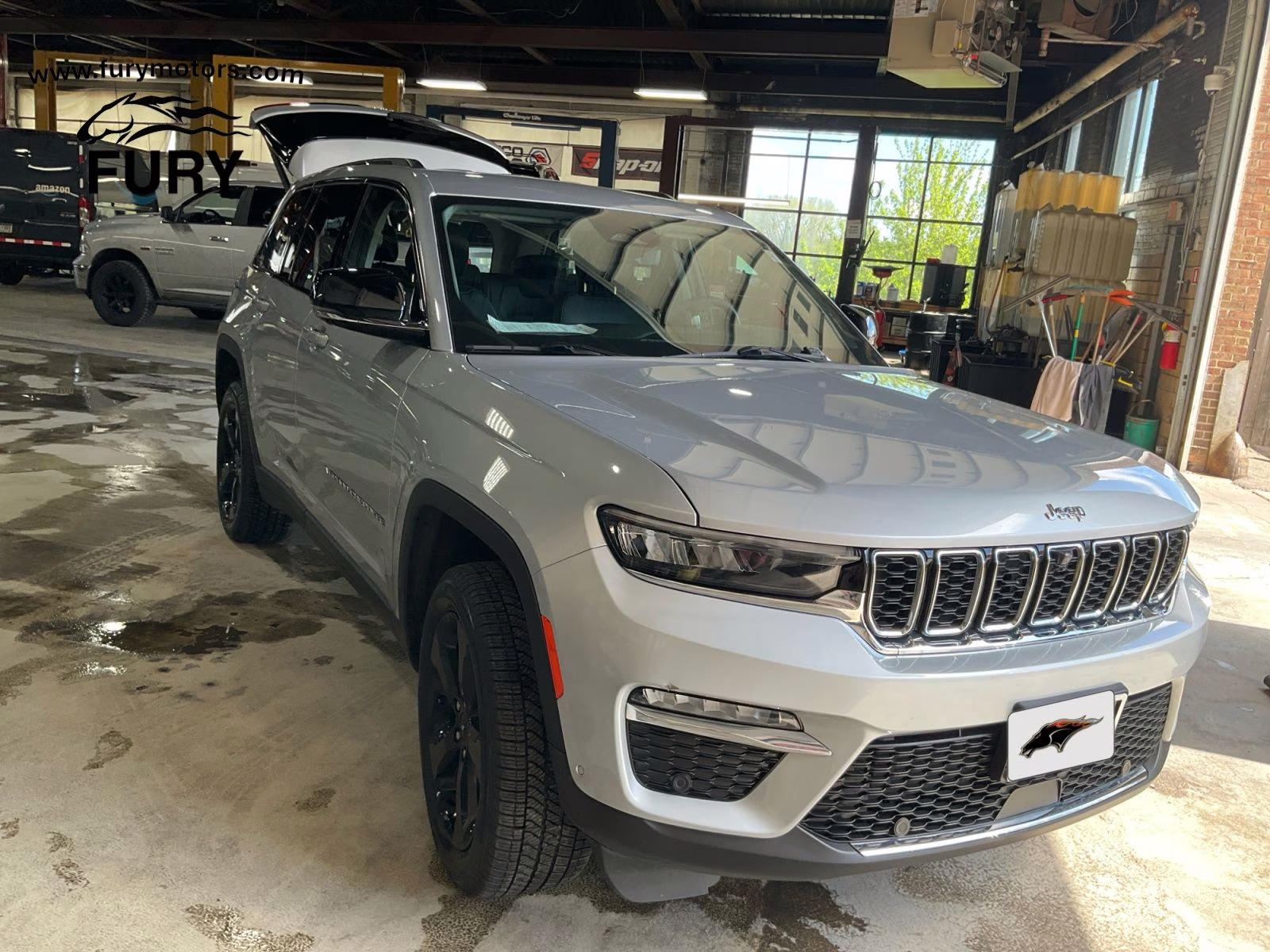 2023 Silver Zynith Jeep Grand Cherokee Limited 4X4 SUV