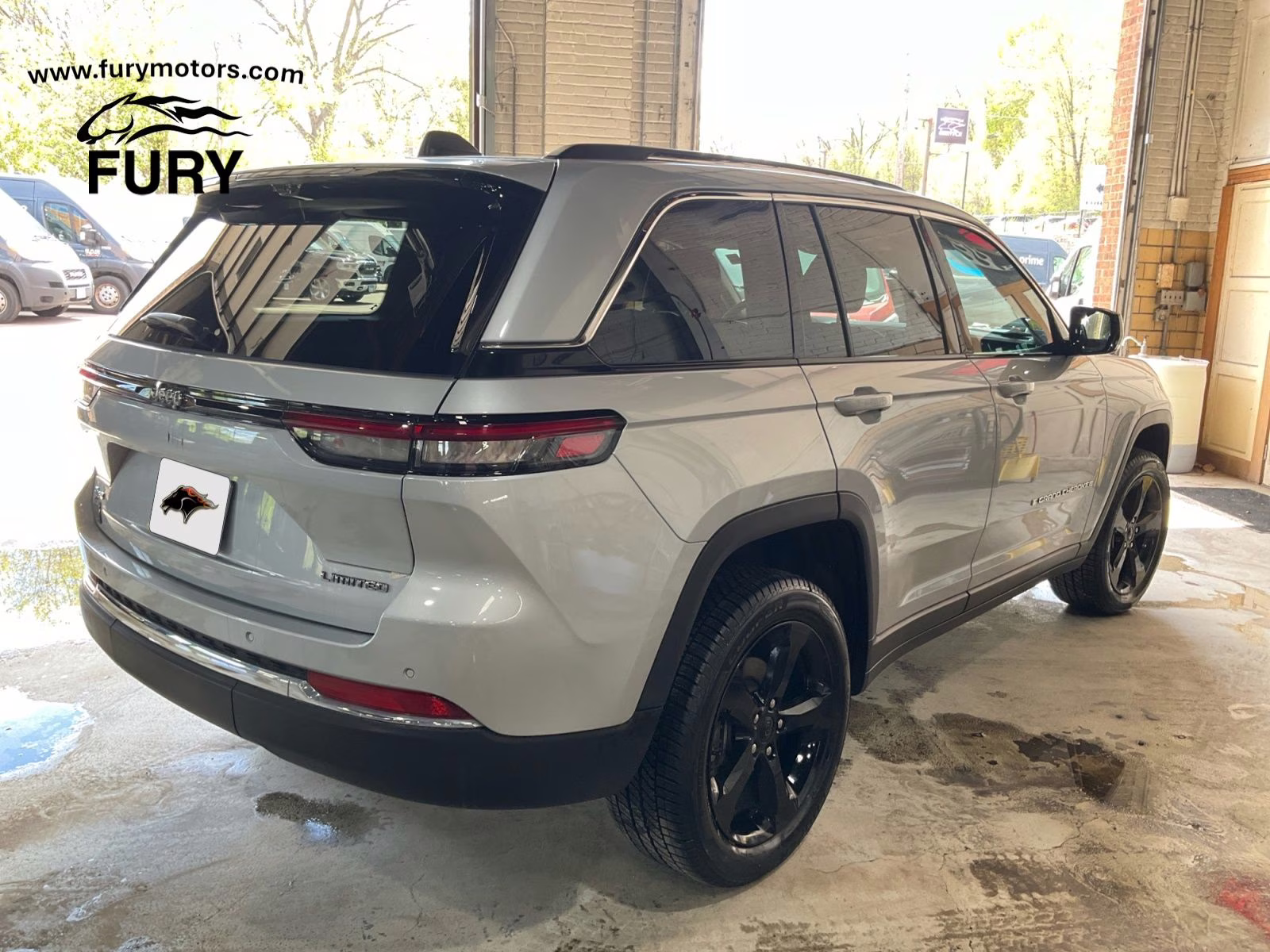 2023 Silver Zynith Jeep Grand Cherokee Limited 4X4 SUV
