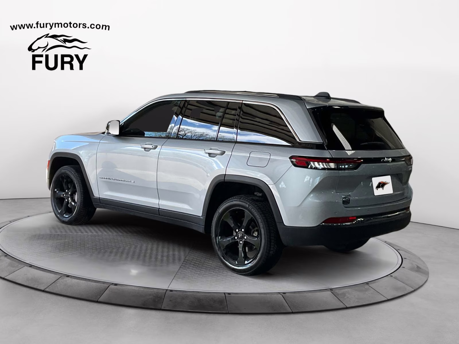 2023 Silver Zynith Jeep Grand Cherokee Limited 4X4 SUV