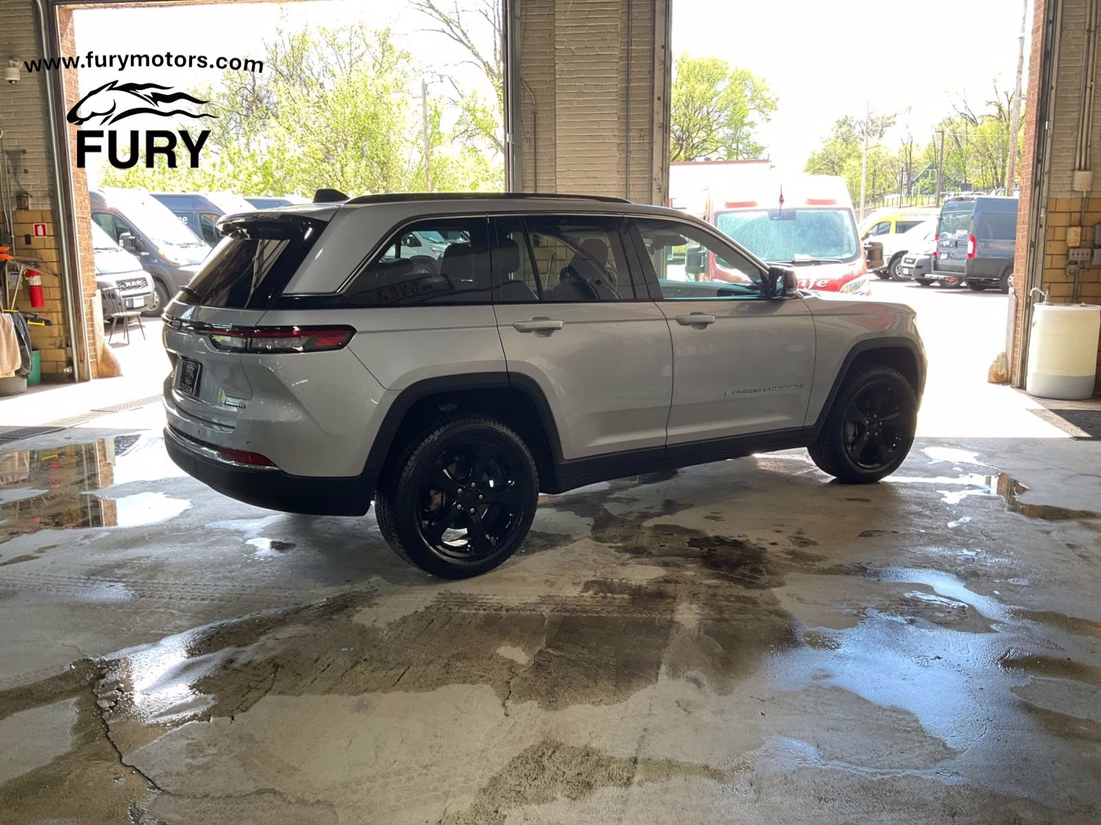 2023 Silver Zynith Jeep Grand Cherokee Limited 4X4 SUV