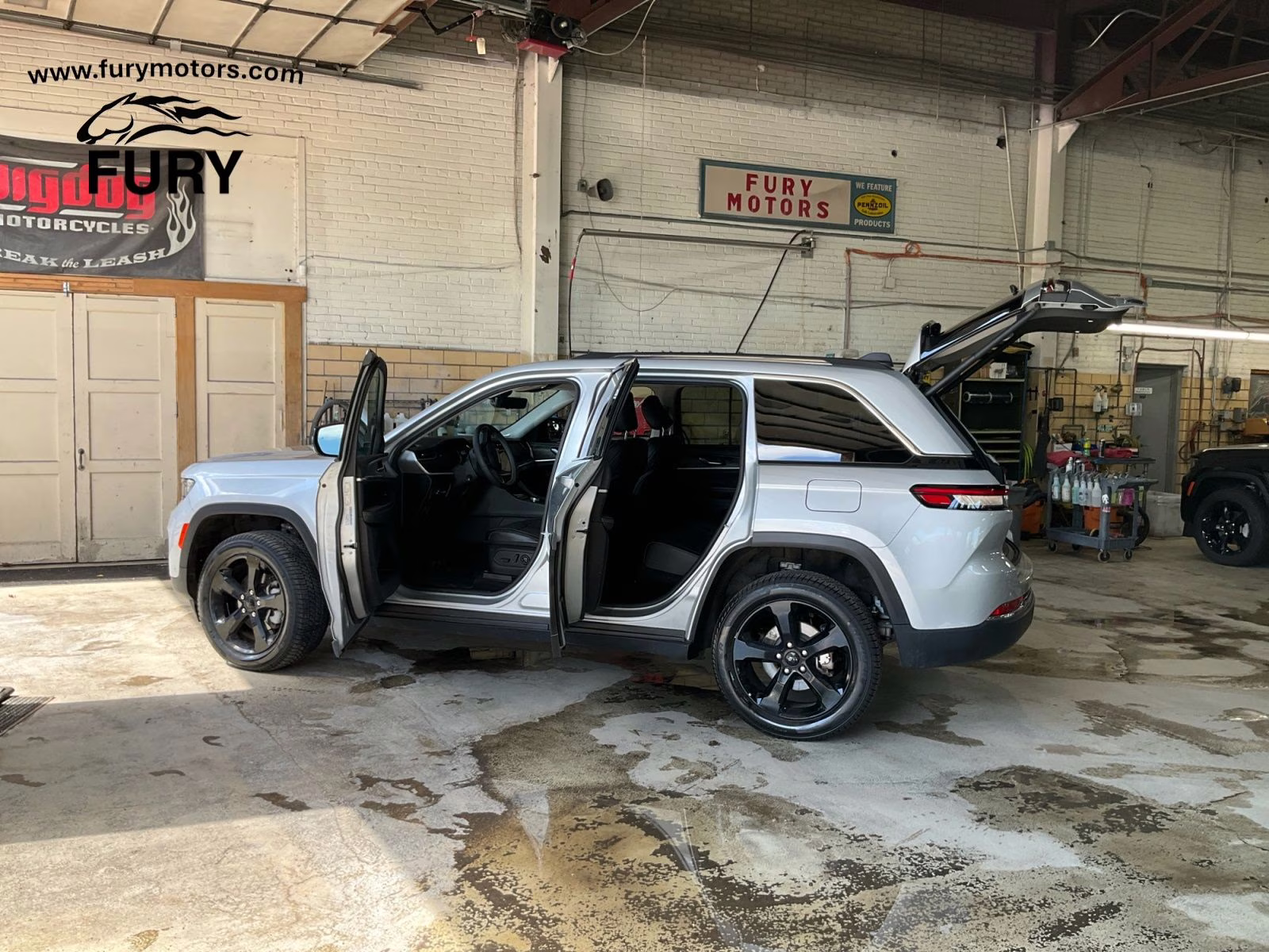 2023 Silver Zynith Jeep Grand Cherokee Limited 4X4 SUV