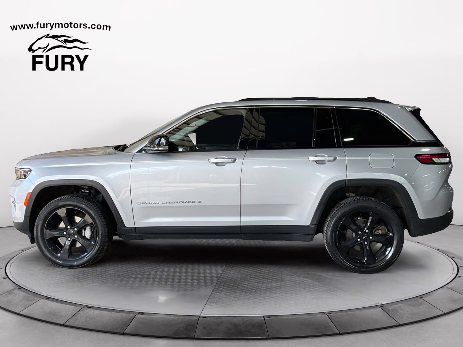 2023 Silver Zynith Jeep Grand Cherokee Limited 4X4 SUV