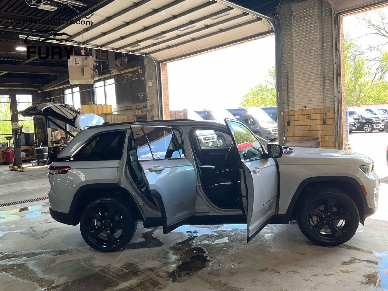 2023 Silver Zynith Jeep Grand Cherokee Limited 4X4 SUV