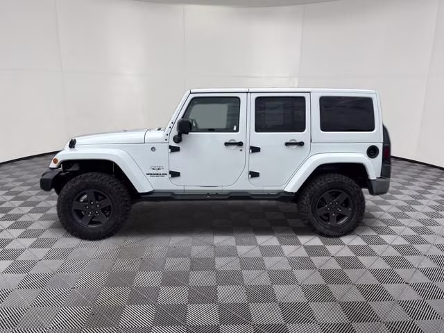2016 Bright White Clearcoat Jeep Wrangler Unlimited Sahara 4X4 SUV