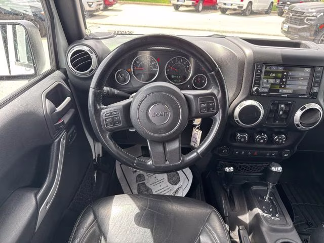 2016 Bright White Clearcoat Jeep Wrangler Unlimited Sahara 4X4 SUV