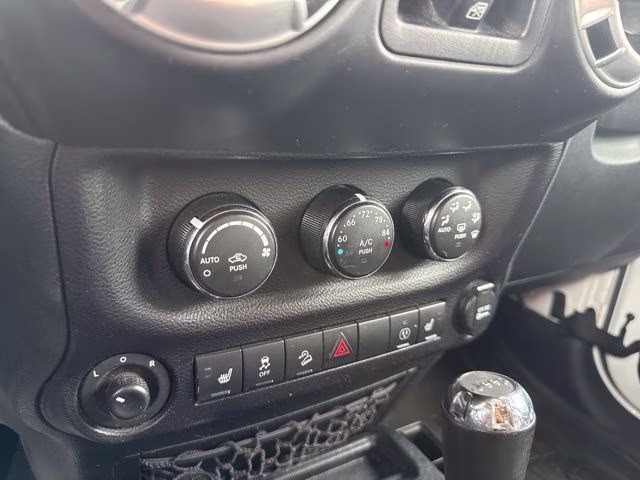 2016 Bright White Clearcoat Jeep Wrangler Unlimited Sahara 4X4 SUV