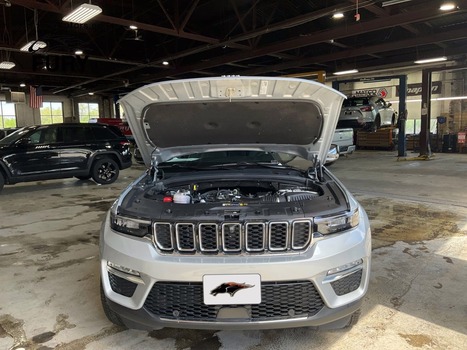 2023 Silver Zynith Jeep Grand Cherokee Limited 4X4 SUV