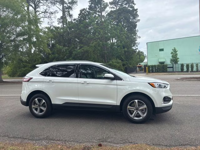 2024 Star White Metallic Tri-Coat Ford Edge SEL AWD SUV