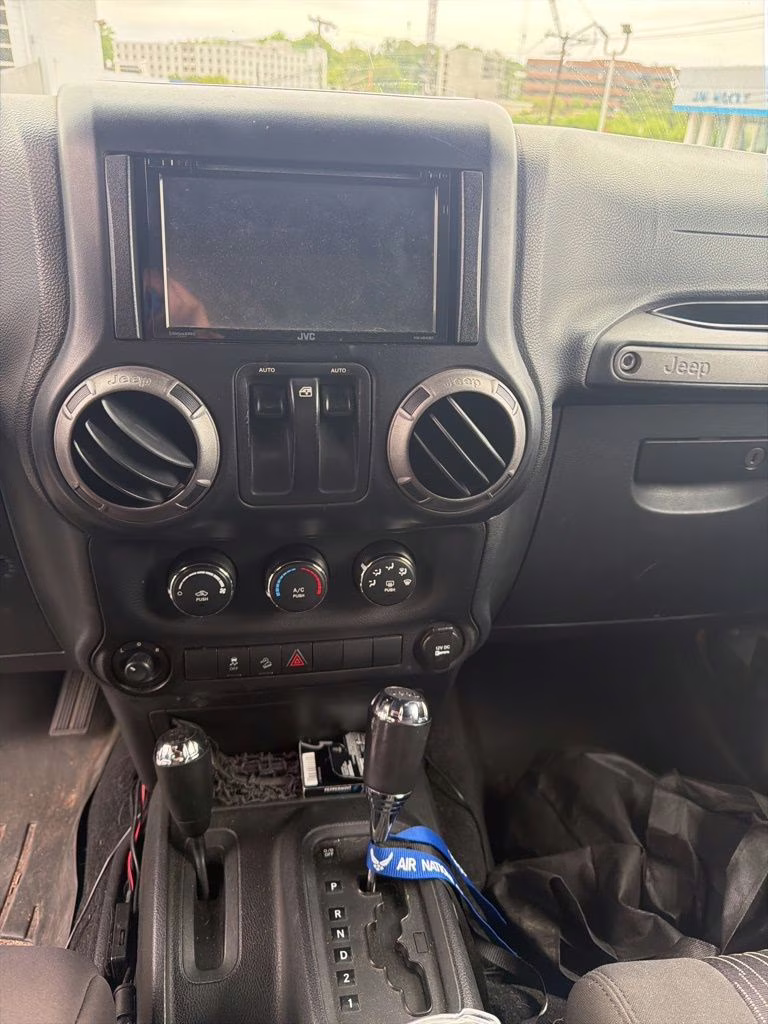 2011 Bright Silver Metallic Clearcoat Jeep Wrangler Sport 4X4 SUV