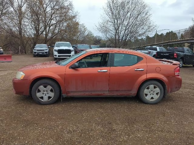2008 Sunburst Orange Pearlcoat Dodge Avenger SE FWD Sedan
