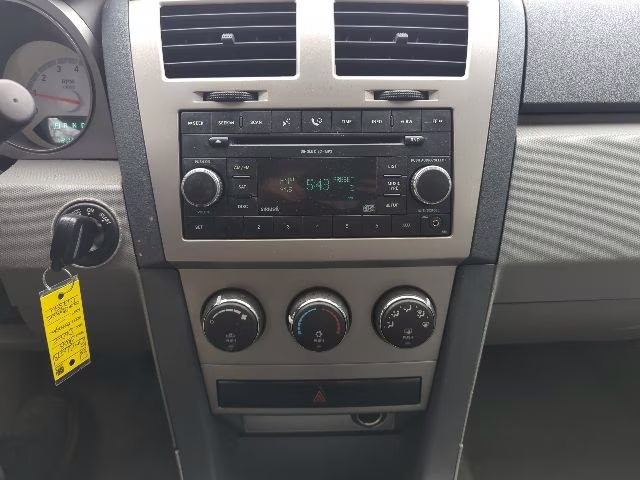 2008 Sunburst Orange Pearlcoat Dodge Avenger SE FWD Sedan