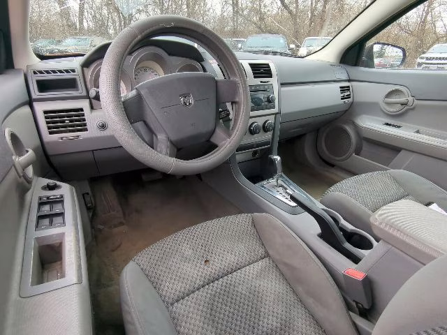 2008 Sunburst Orange Pearlcoat Dodge Avenger SE FWD Sedan