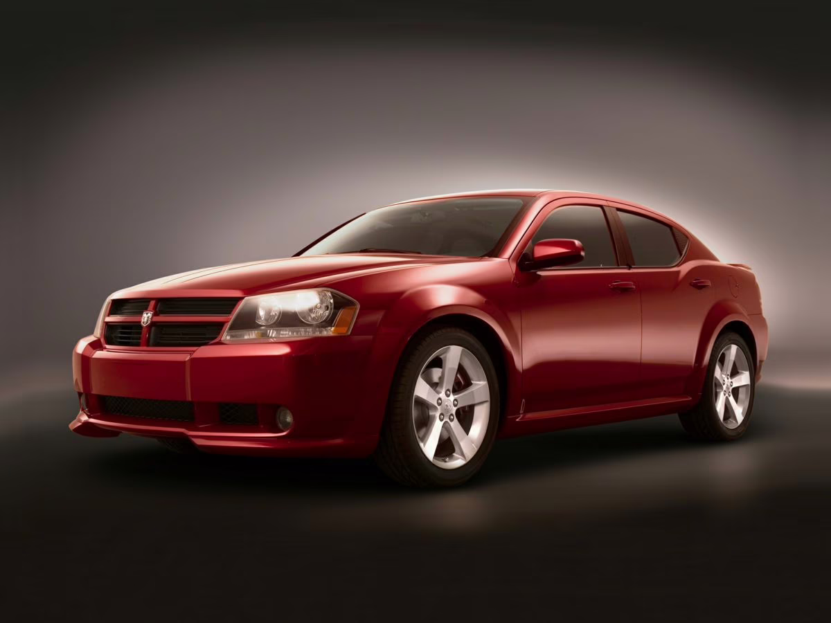 2008 Orange Dodge Avenger SE FWD Sedan