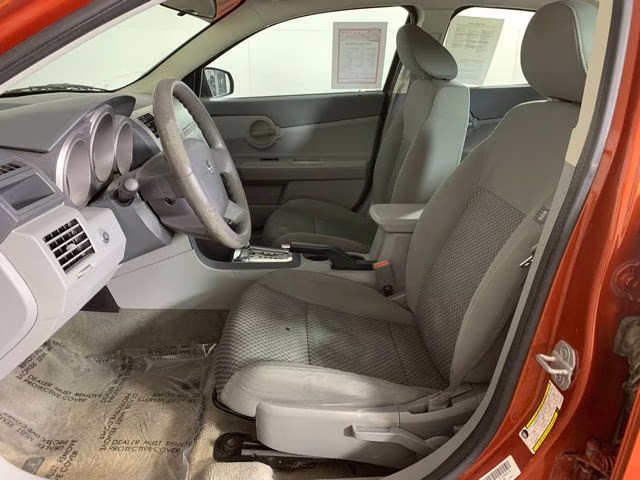 2008 Sunburst Orange Pearlcoat Dodge Avenger SE FWD Sedan