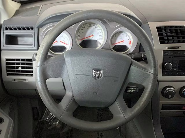 2008 Sunburst Orange Pearlcoat Dodge Avenger SE FWD Sedan