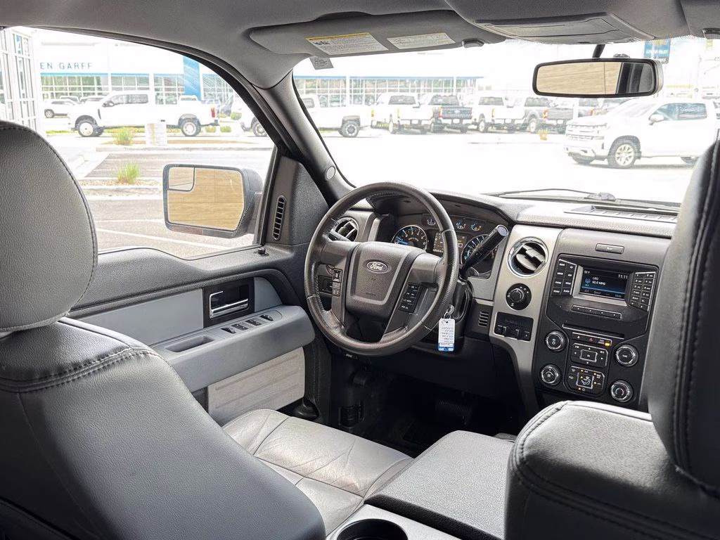 2014 Tuxedo Black Metallic Ford F-150 XLT 4X4 Truck