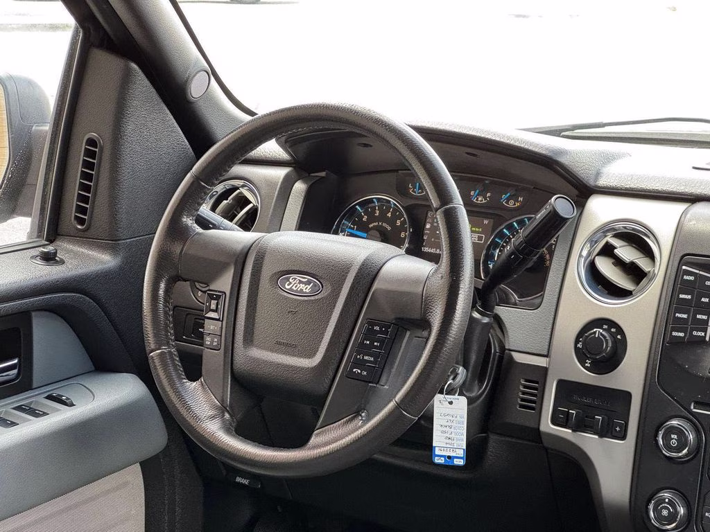 2014 Tuxedo Black Metallic Ford F-150 XLT 4X4 Truck