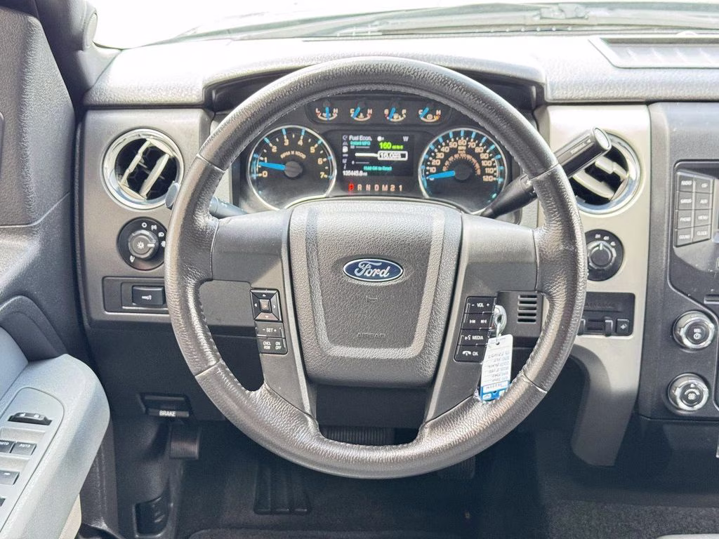 2014 Tuxedo Black Metallic Ford F-150 XLT 4X4 Truck