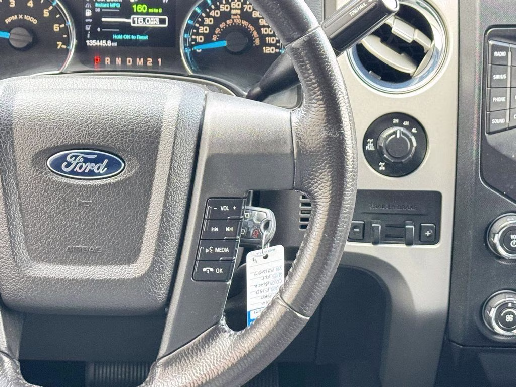 2014 Tuxedo Black Metallic Ford F-150 XLT 4X4 Truck