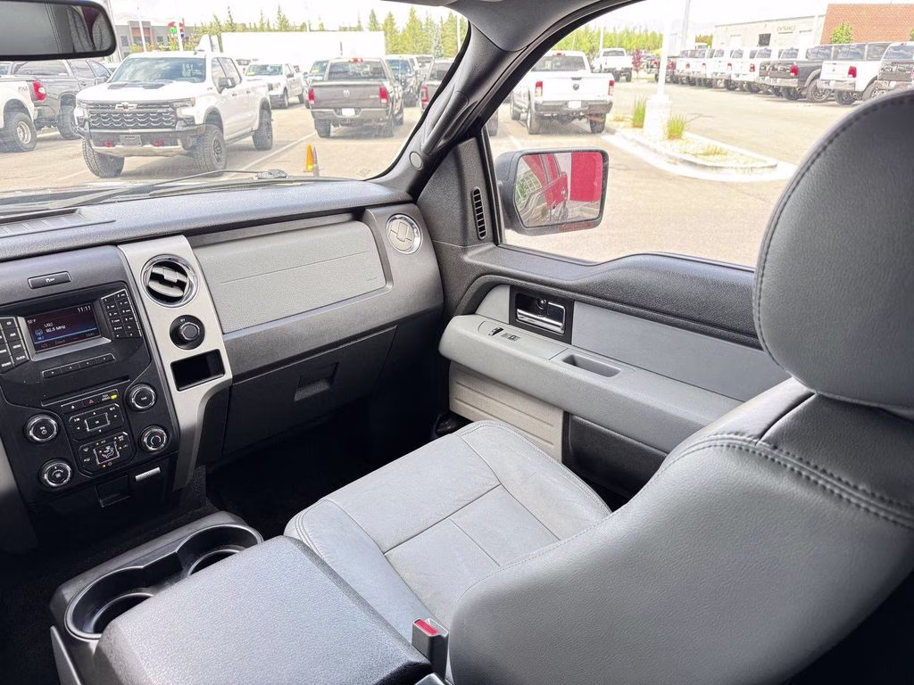 2014 Tuxedo Black Metallic Ford F-150 XLT 4X4 Truck