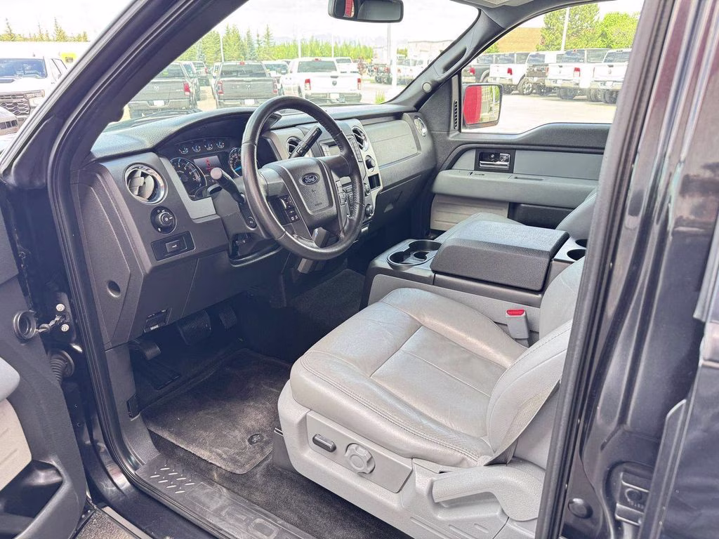 2014 Tuxedo Black Metallic Ford F-150 XLT 4X4 Truck