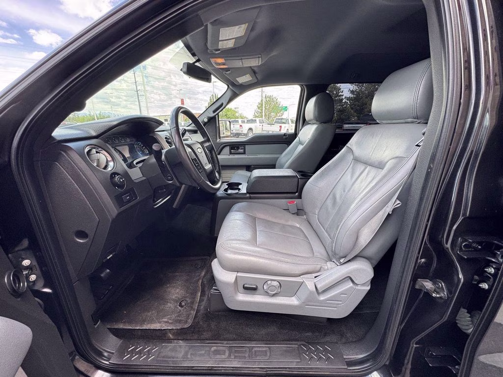 2014 Tuxedo Black Metallic Ford F-150 XLT 4X4 Truck