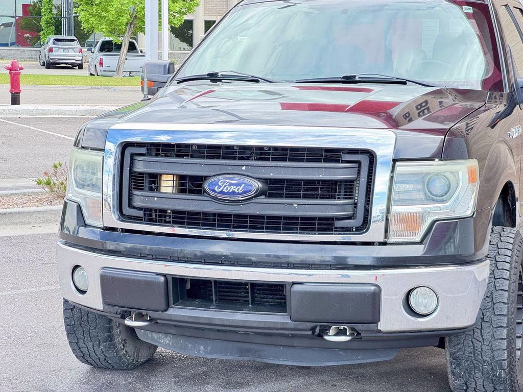 2014 Tuxedo Black Metallic Ford F-150 XLT 4X4 Truck