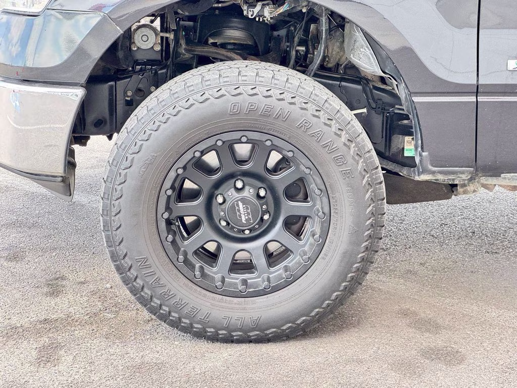 2014 Tuxedo Black Metallic Ford F-150 XLT 4X4 Truck
